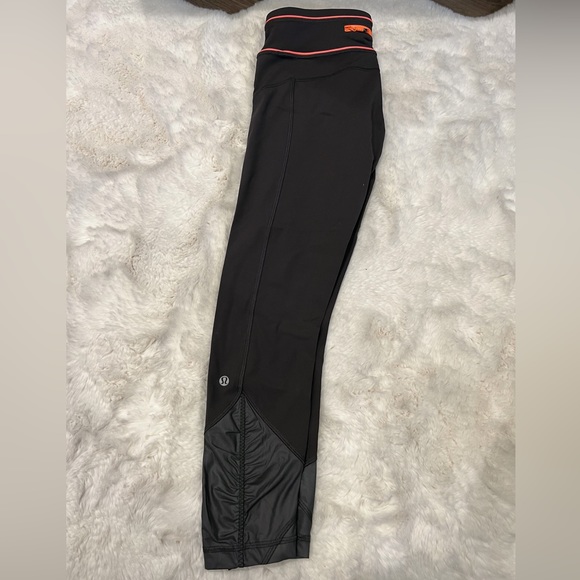 Lululemon capris. Like new. Barely worn. Size 6. Dark grey with coral. - Picture 3 of 10